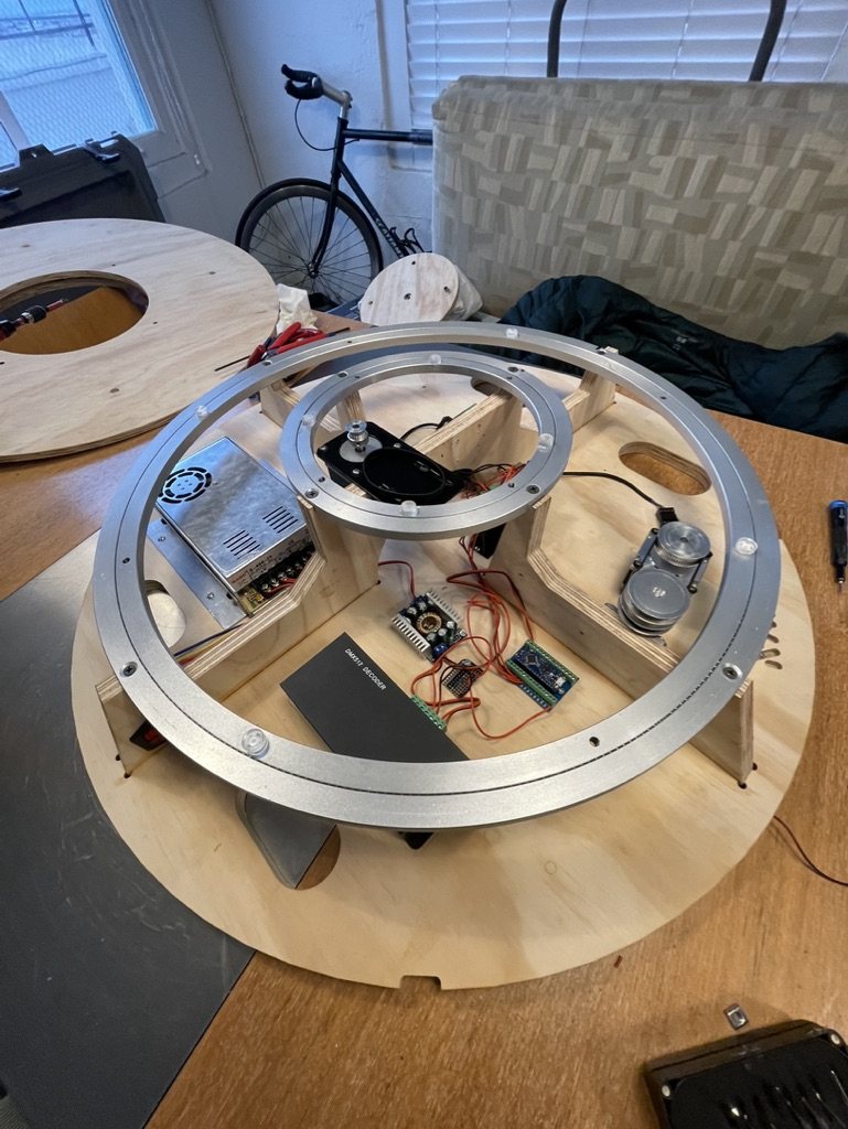 Drive electronics and motor assembled inside the rotary base