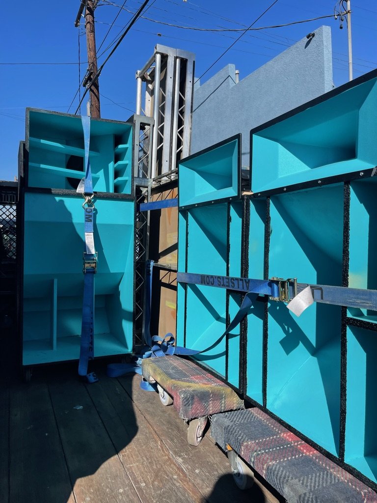 Turquoise horn-loaded cabinets outdoors