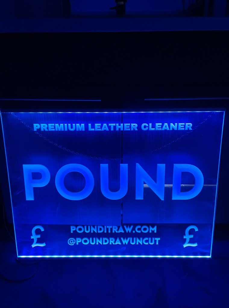 Edge-lit Pound acrylic sign