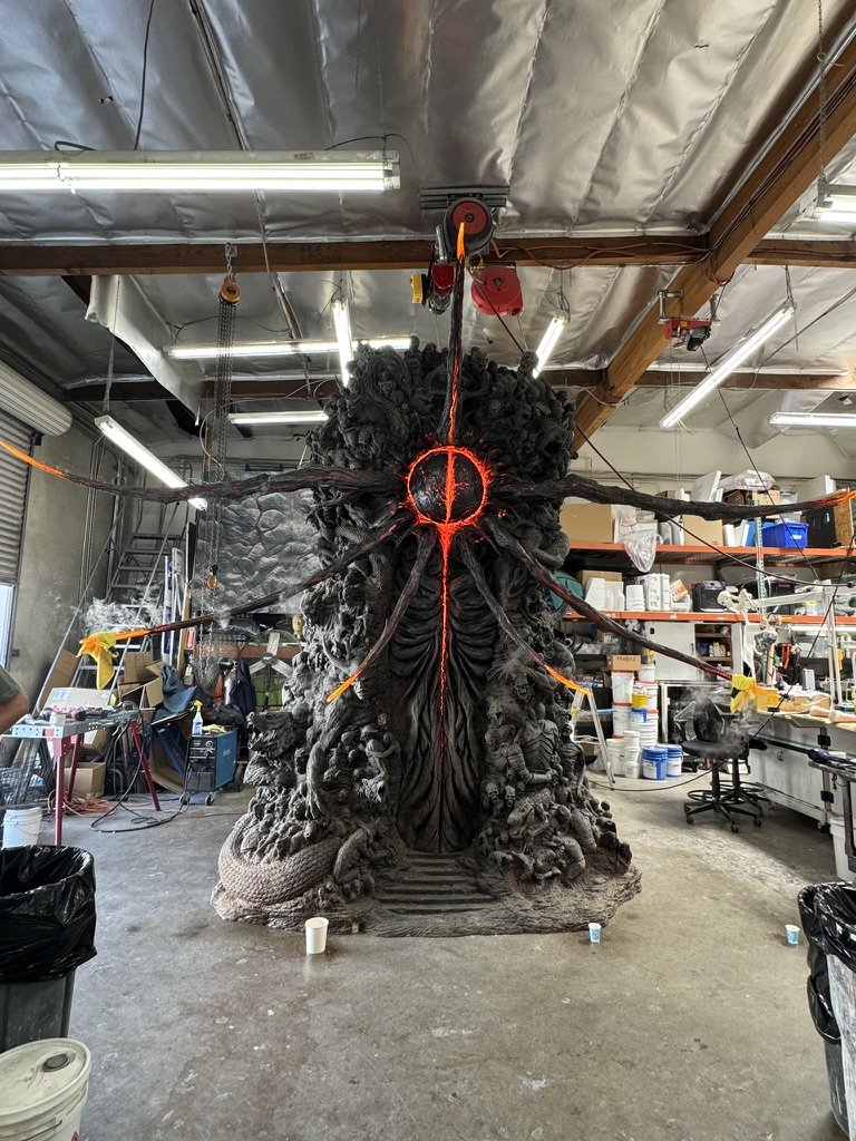 Large practical effects sculpture with glowing core